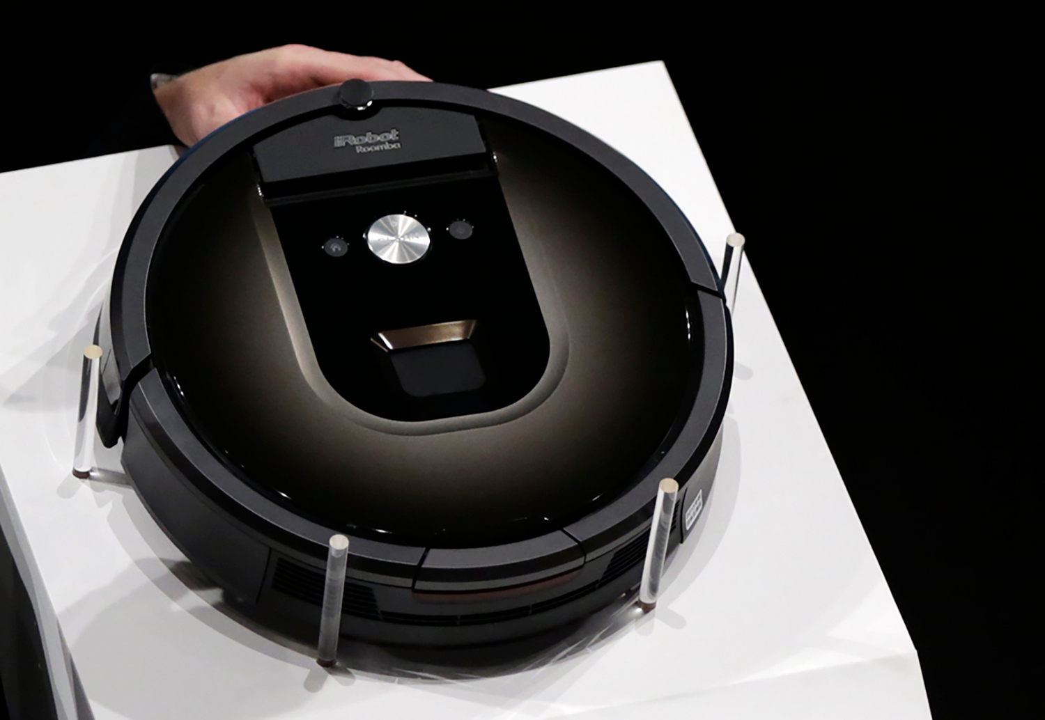 FILE - A Roomba 980 vacuum cleaning robot is presented during a presentation in Tokyo, on Sept. 29, 2015. (AP Photo/Eugene Hoshiko, File)