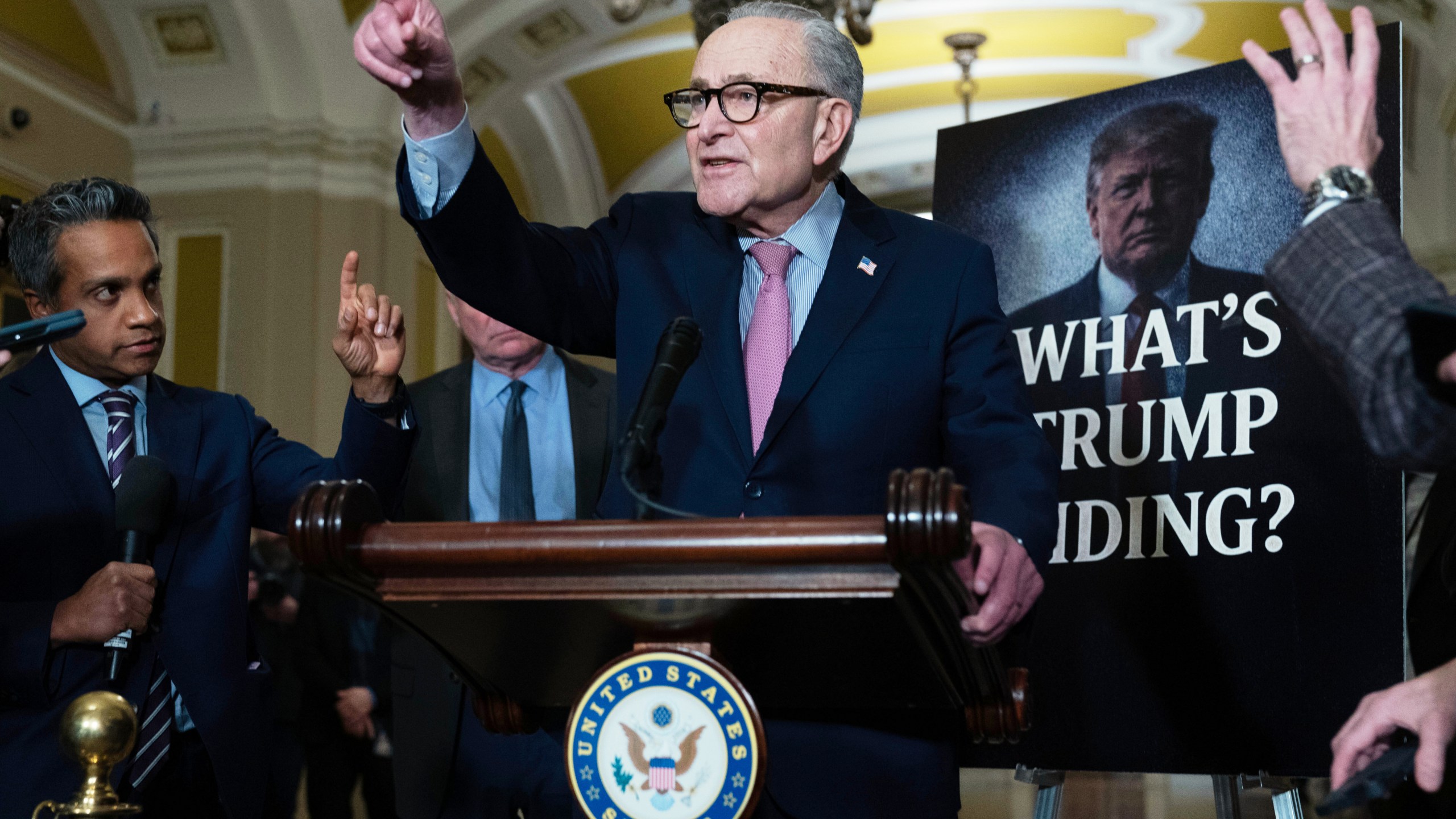 Senate Minority Leader Chuck Schumer, D-N.Y., speaks to reporters following the weekly policy luncheons at the Capitol, Tuesday, Dec. 16, 2025, in Washington. (AP Photo/Jose Luis Magana)