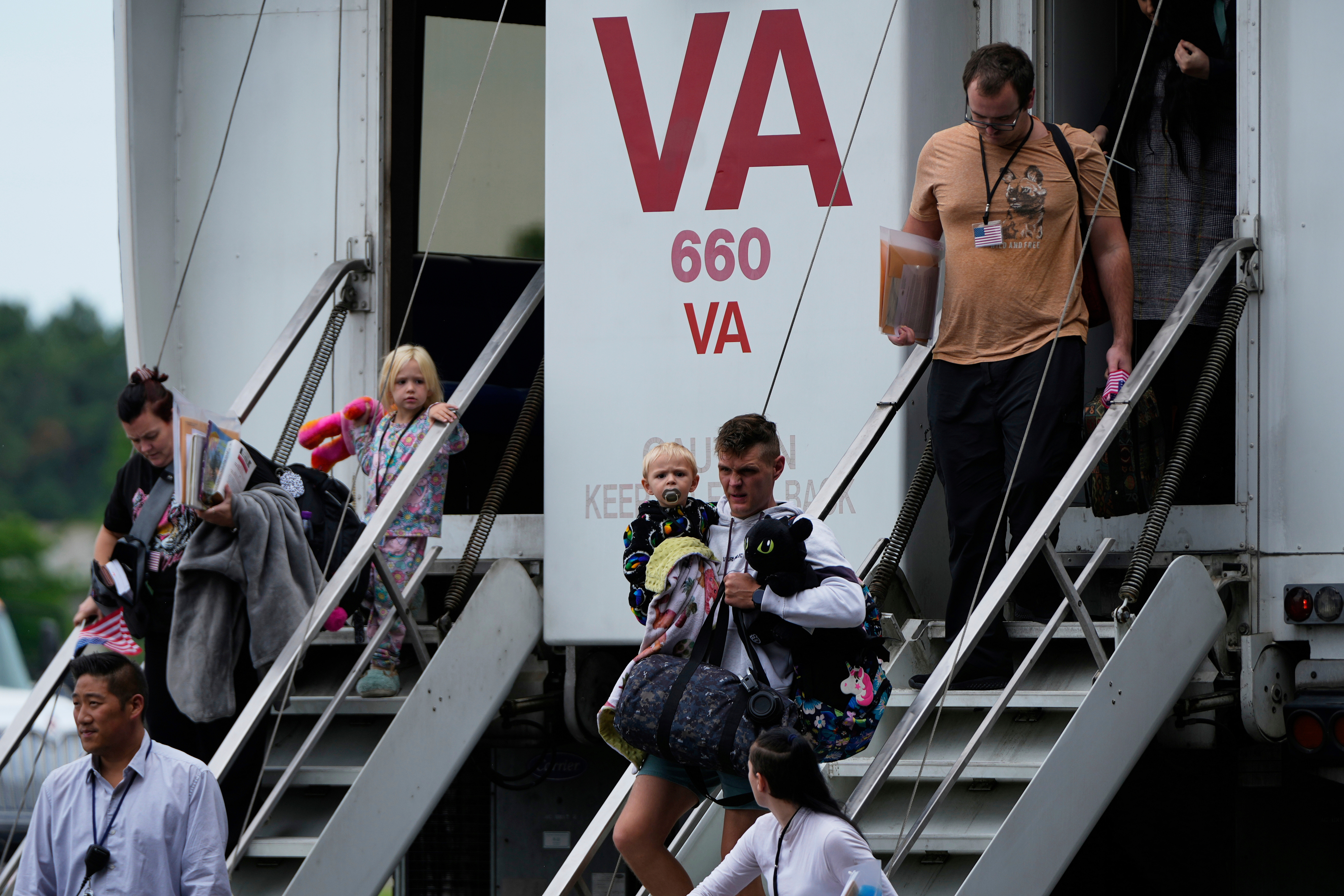 FILE - Refugees from South Africa, arrive Monday, May 12, 2025, at Dulles International Airport in Dulles, Va. (AP Photo/Julia Demaree Nikhinson, File)