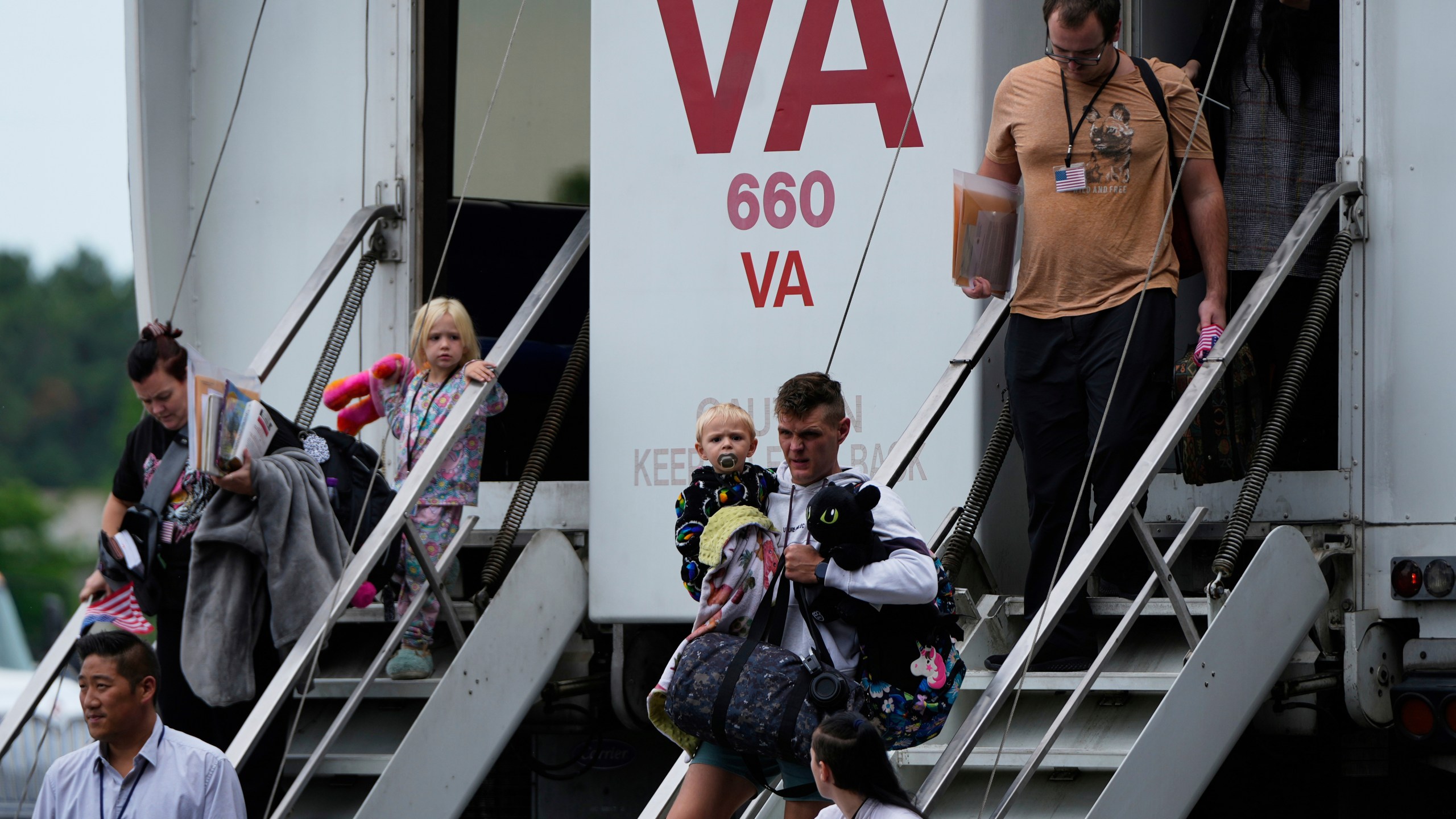 FILE - Refugees from South Africa, arrive Monday, May 12, 2025, at Dulles International Airport in Dulles, Va. (AP Photo/Julia Demaree Nikhinson, File)