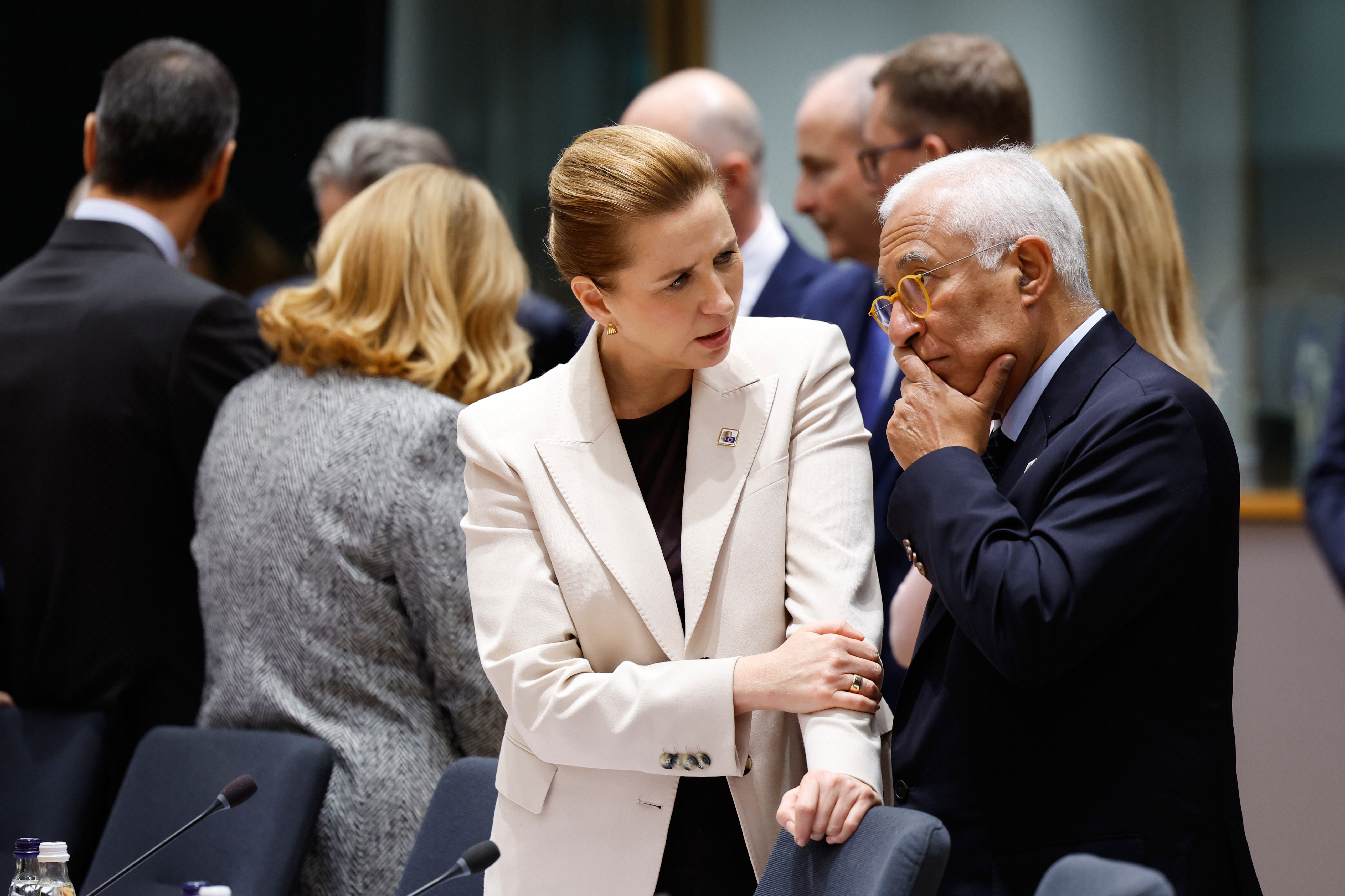 European Council President Antonio Costa, center right, speaks with Denmark's Prime Minister Mette Frederiksen, center left, during a round table meeting at the EU Summit in Brussels, Thursday, Dec. 18, 2025. (AP Photo/Geert Vanden Wijngaert)