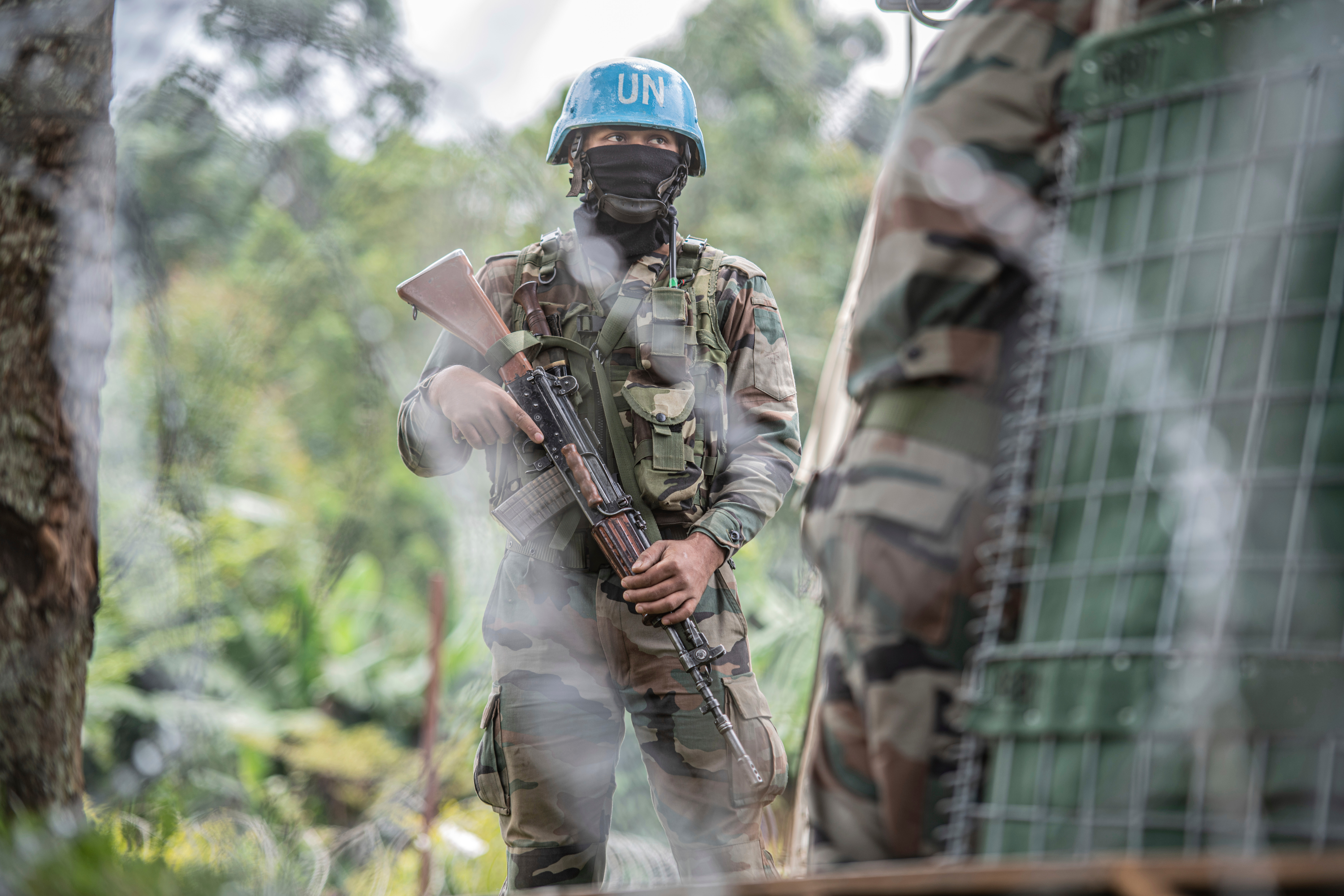 FILE - A MONUSCO blue helmet deployed near Kibumba, north of Goma, Democratic Republic of Congo, on Jan. 28, 2022. (AP Photo/Moses Sawasawa, File)