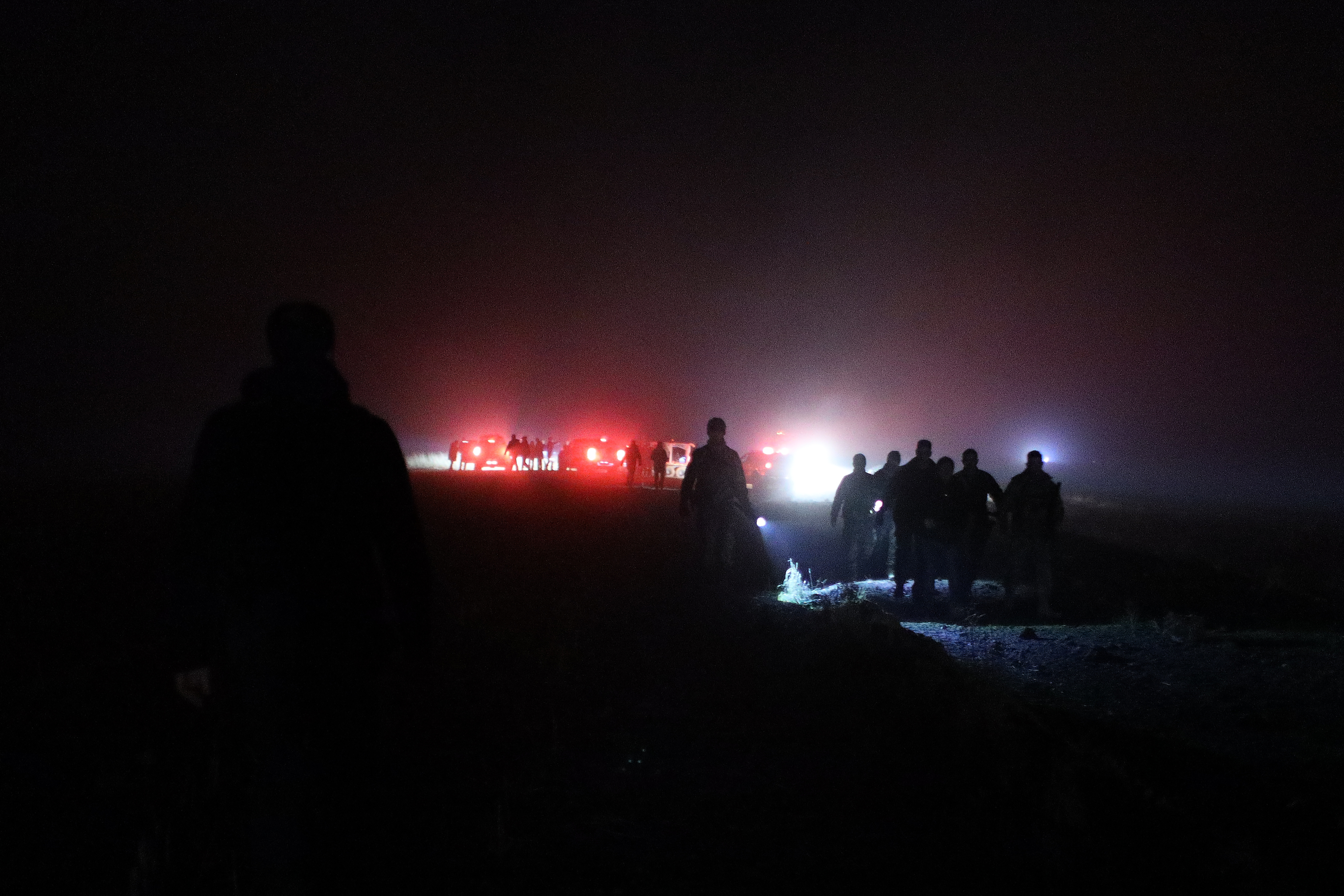 Turkish rescue teams search for the remains of a private jet carrying Libya's military chief and four others that crashed after taking off from Ankara, killing everyone on board, in Ankara, Turkey, Tuesday, Dec. 23, 2025. (AP Photo/Efekan Akyuz)