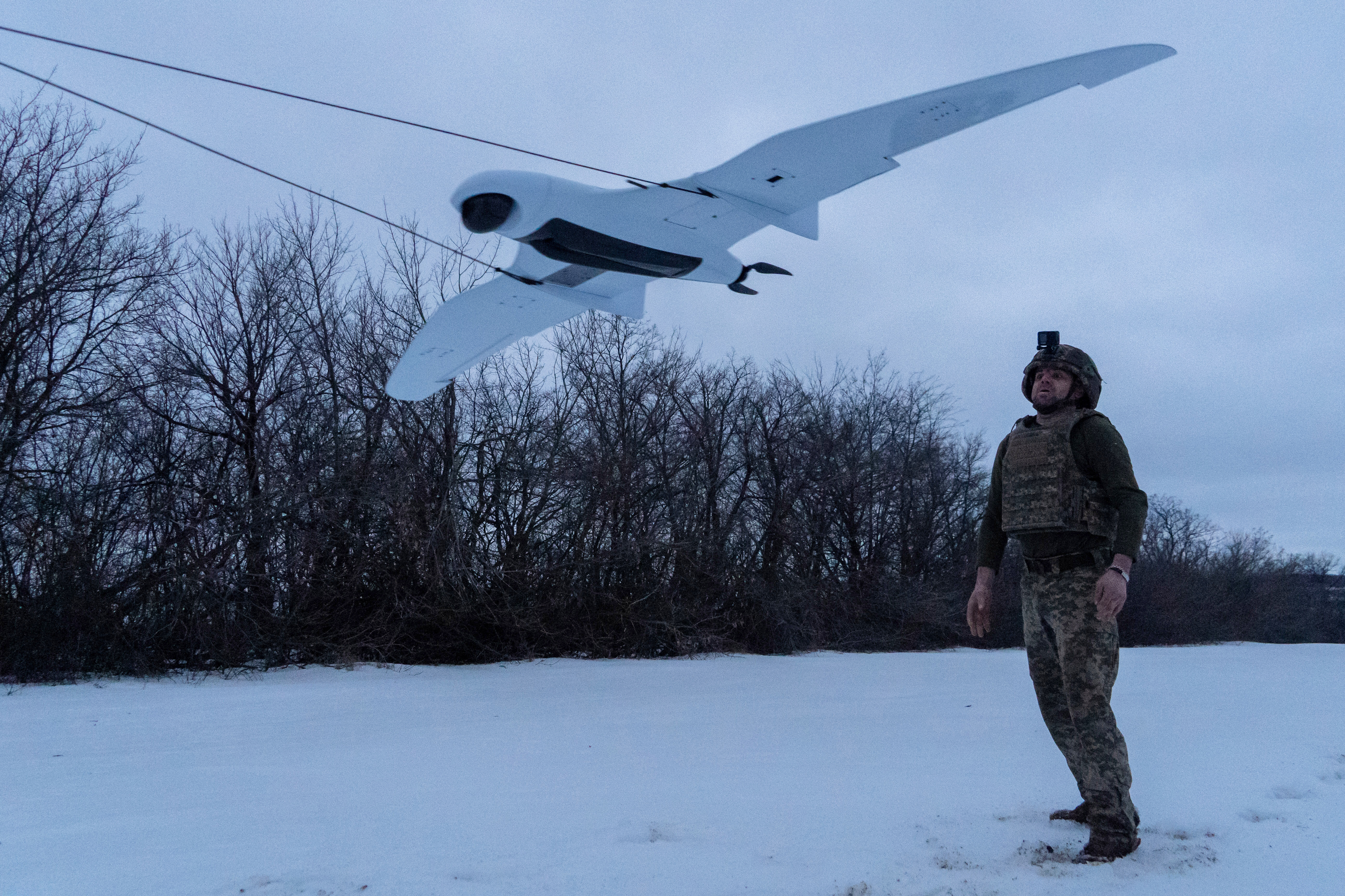 A Ukrainian soldier of the 48th separate brigade launches a reconnaissance drone in Kharkiv region, Ukraine, Wednesday, March 4, 2026. (AP Photo/Andrii Marienko)